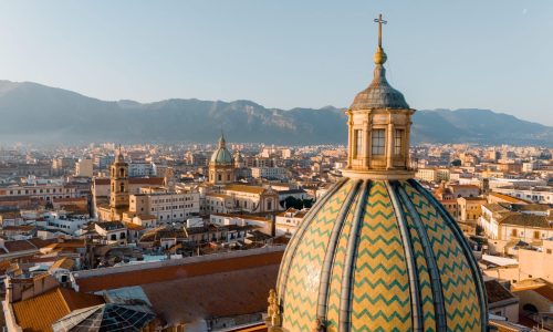Close-up,Aerial,View,Of,Palermos,Iconic,Maiolica-tiled,Dome,Glowing,In